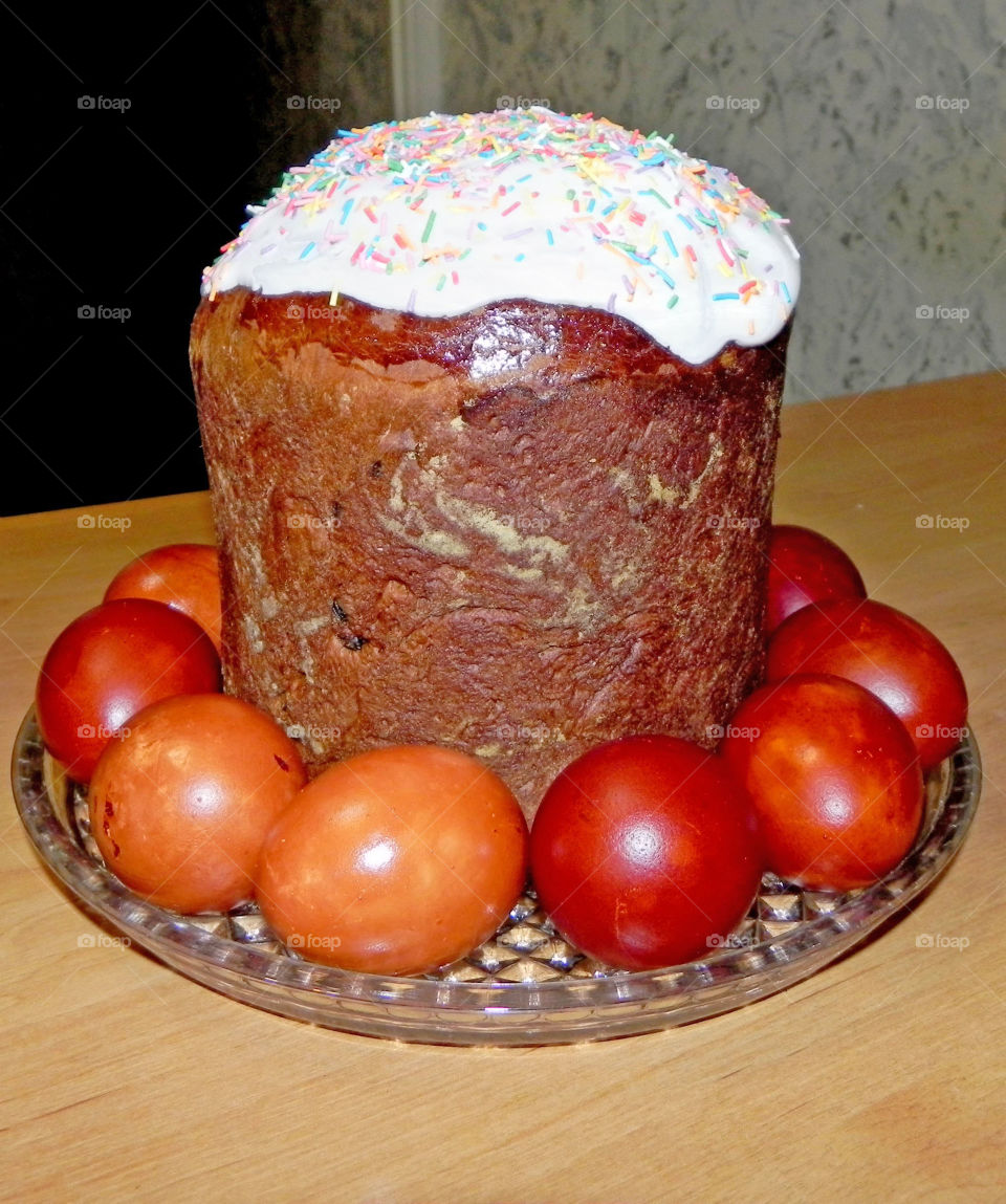 Easter Pie on glass dish rounded by Easter Eggs