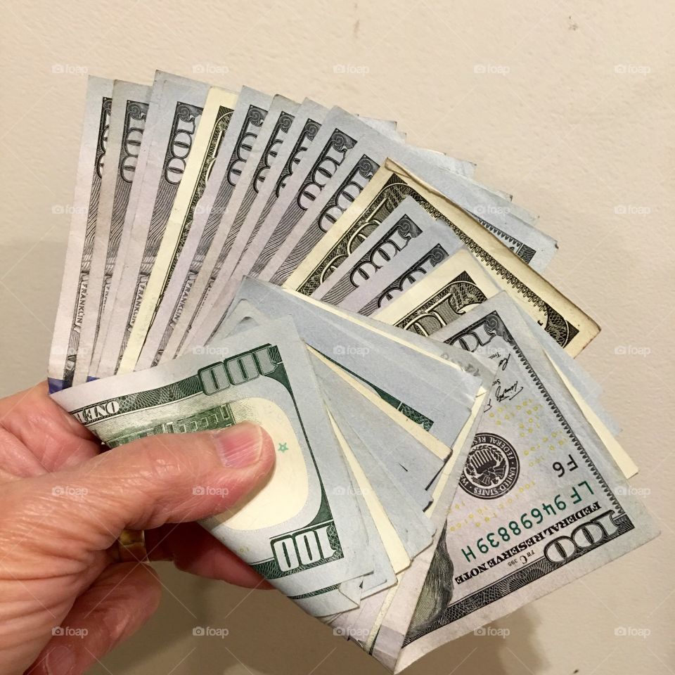 $100 each U.S. Currency- Money in Hand