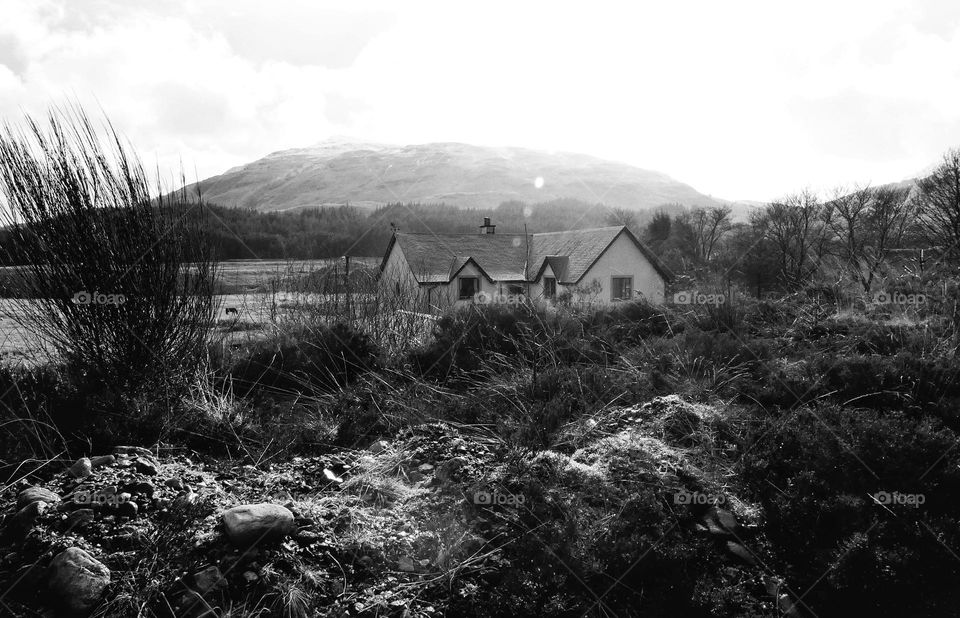 Black and white photo of house in the highlands