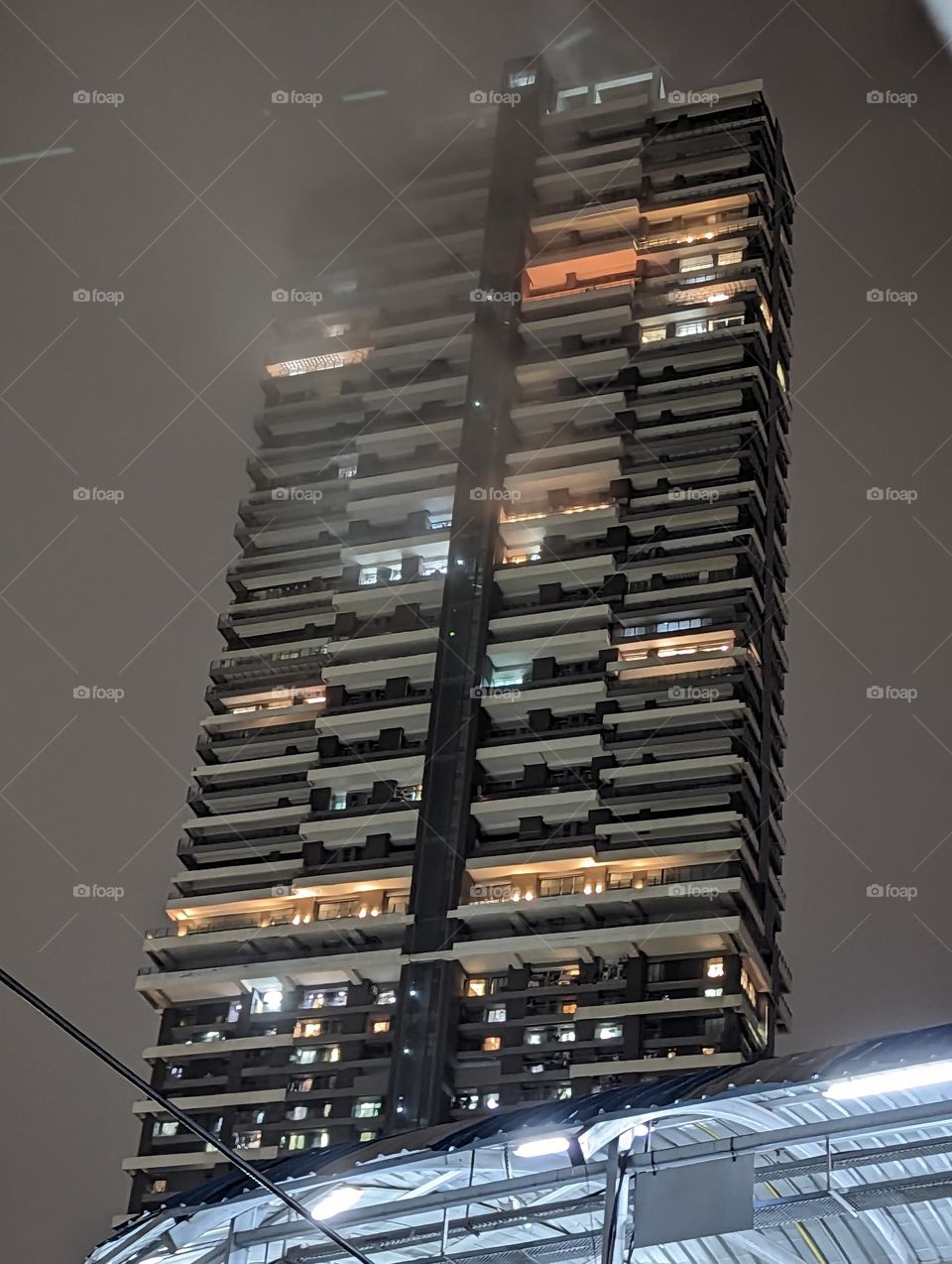 Mumbai Cloudy building in rain.