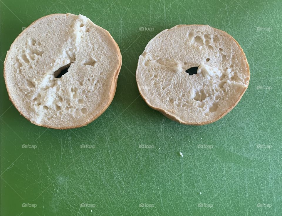 Bagels on a green background- white and green colors 