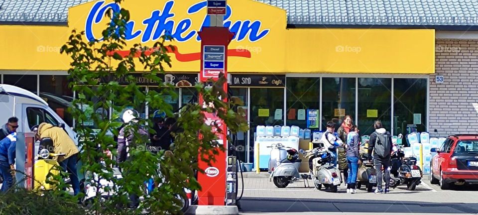 “On the Run” is a fast food chain and day café popular in some areas of rural “Bavaria”, Germany comparable with what “Starbucks” or “McDonald’s” would be in the “United States”. 2023. Hypnotic Productions