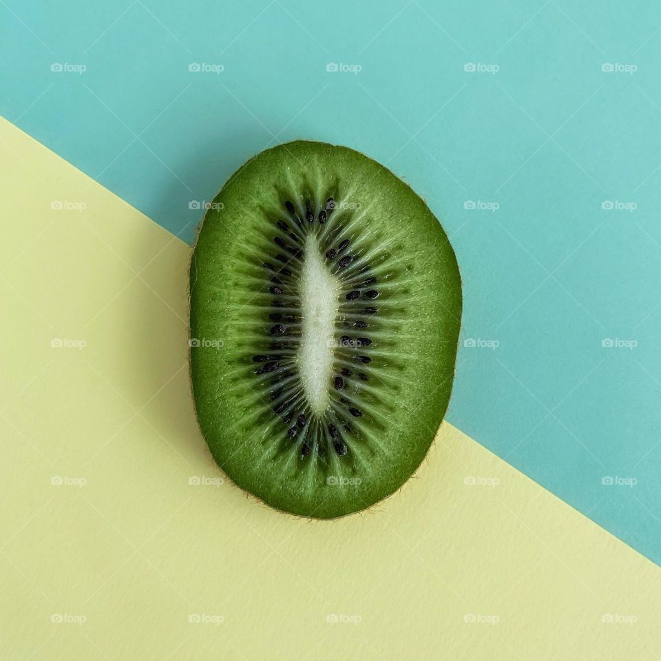 Kiwi on yellow and blue