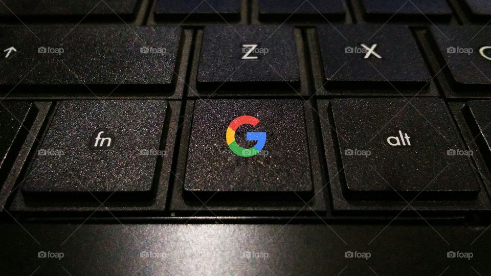 google icon or logo button or key in laptop keyboard