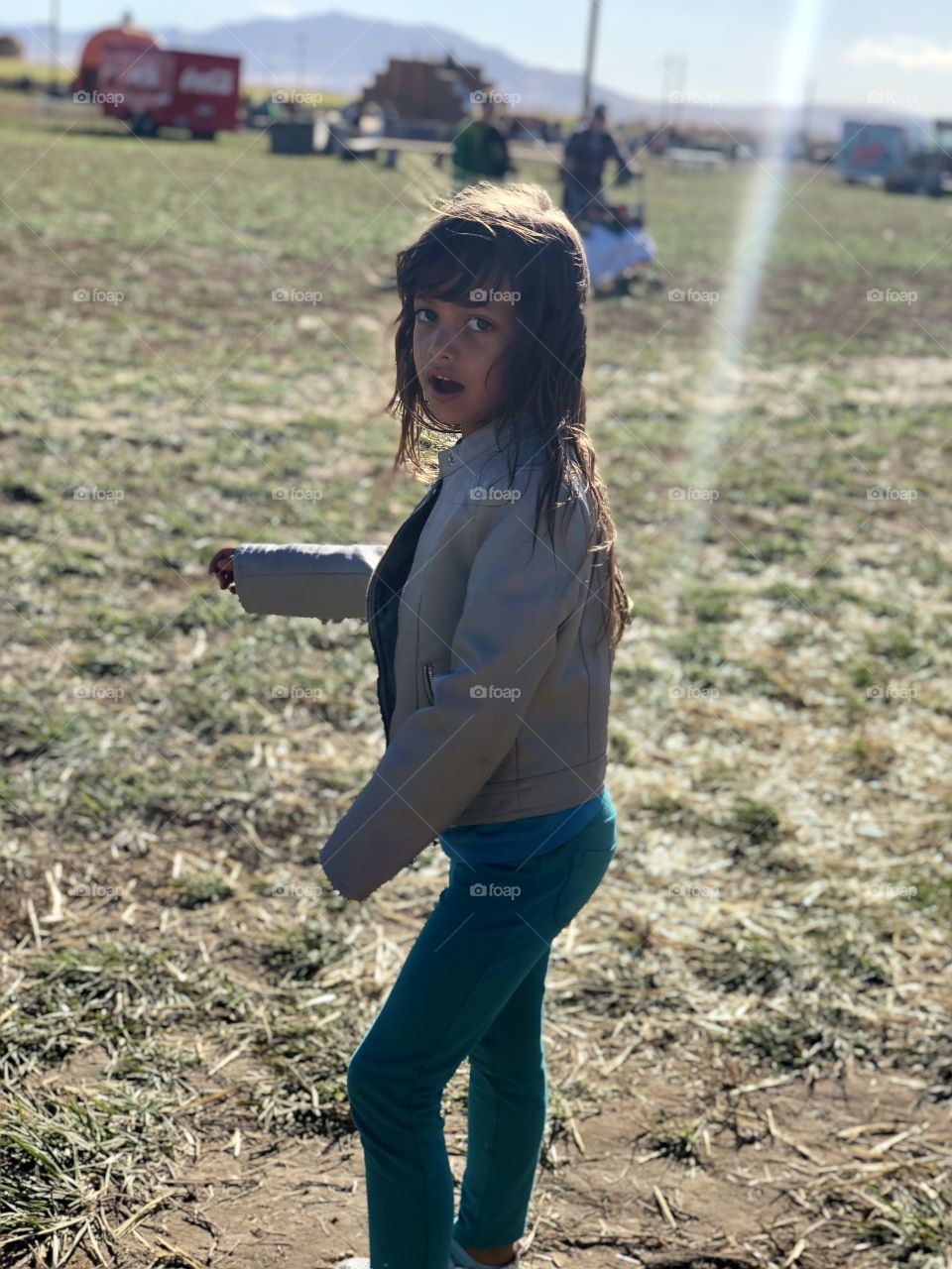 Happy child in the brisk Fall