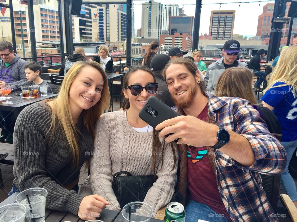 Friends taking selfie