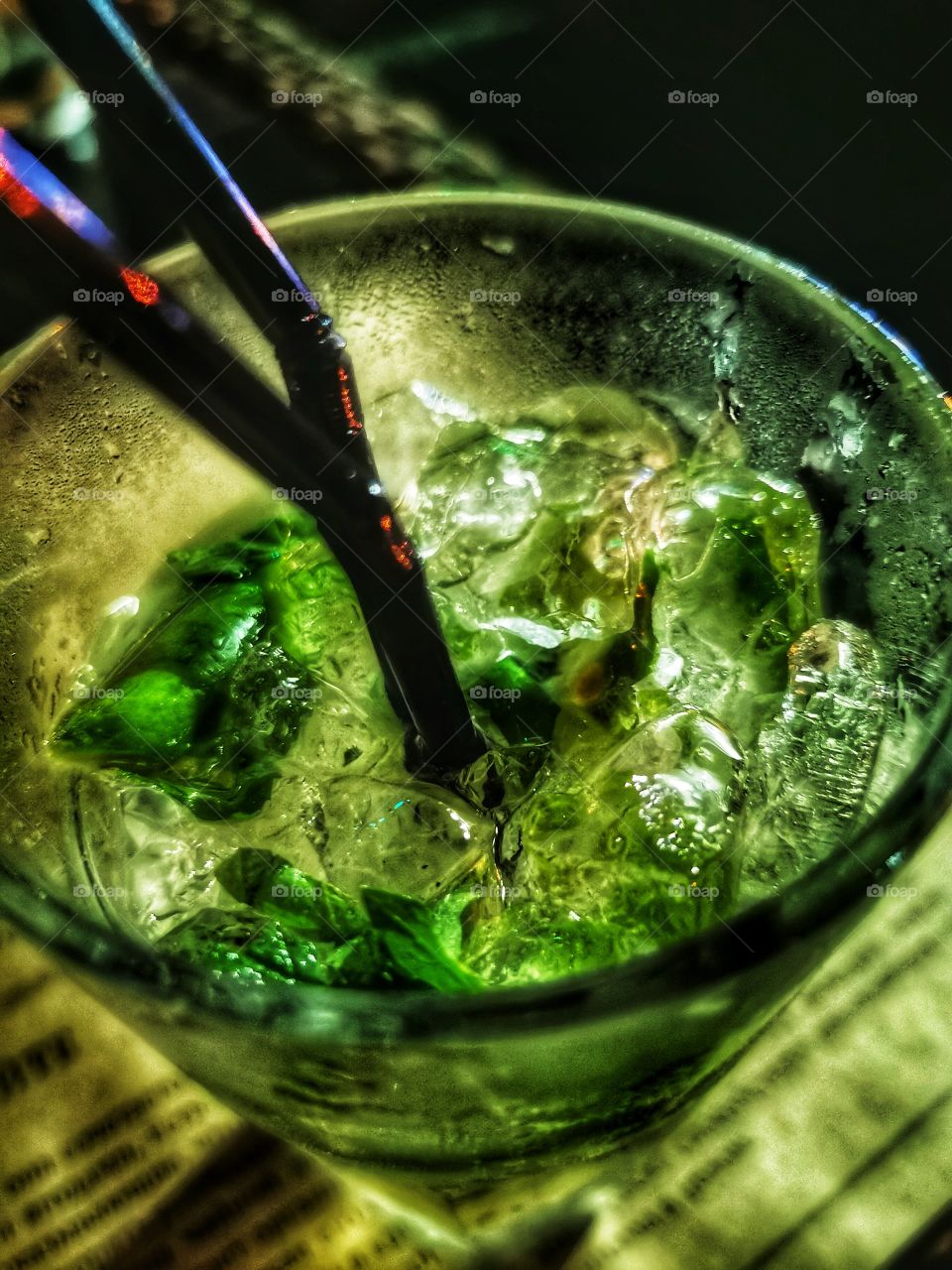 Sweet Cafe restaurant indoor drink yummy served table night part green mint mohito non-alco form circle ellipce tasty tasty table served view outside joy happy