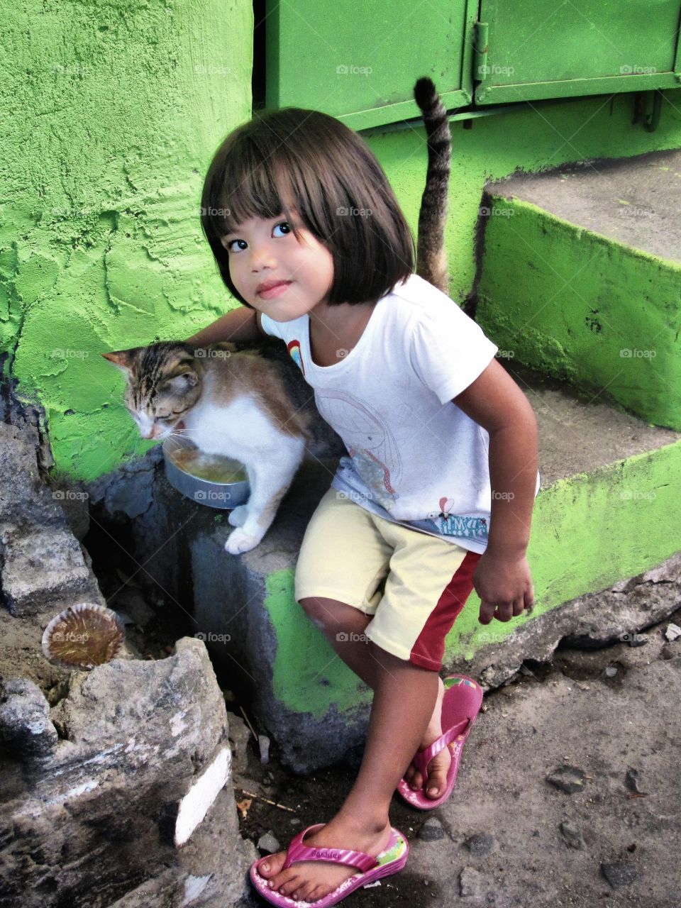 Child and cat
