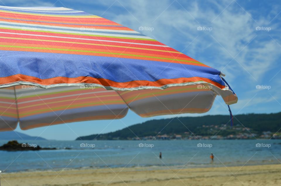 Close-up of beach umbrella