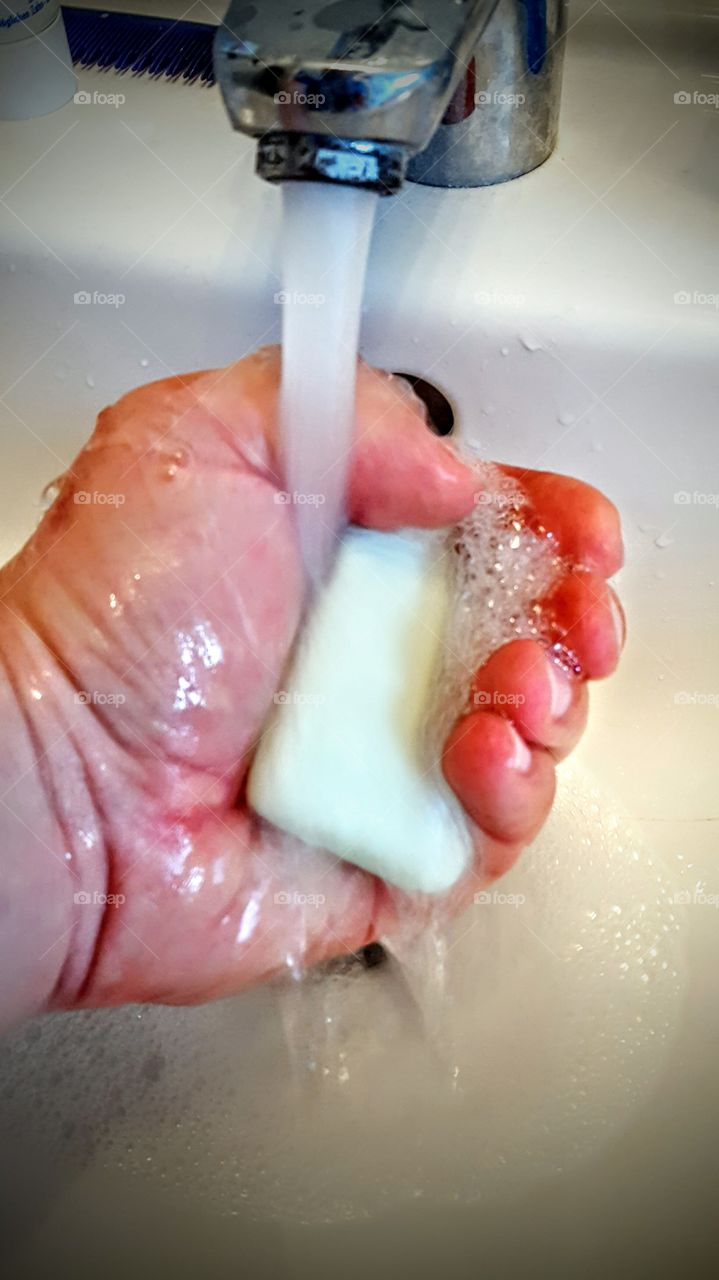 hand with soap