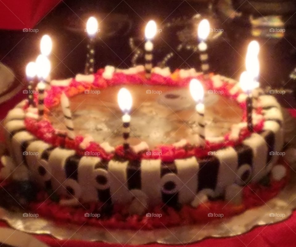 Birthday cake with lighted candles