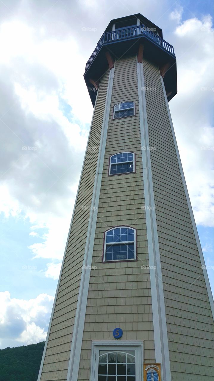 Lighthouse stretching towards the sky.