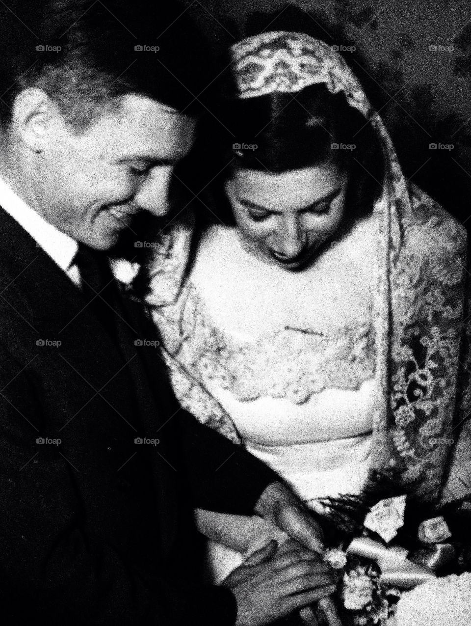 Classic vintage 1940s wedding with handsome groom and blushing bride