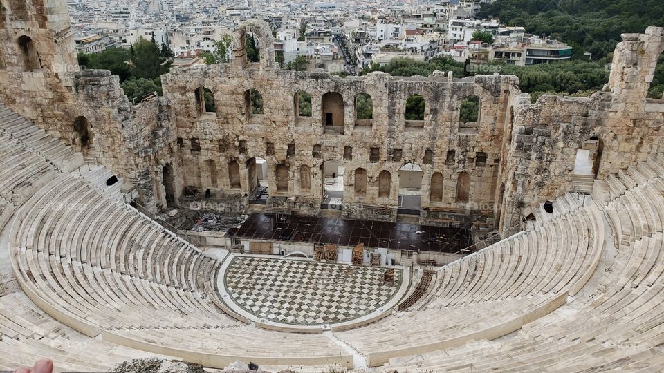View from above, looking down to the Odeon of Herodes Atticus theatre, famous ruins in Athens, Greece, Europe.