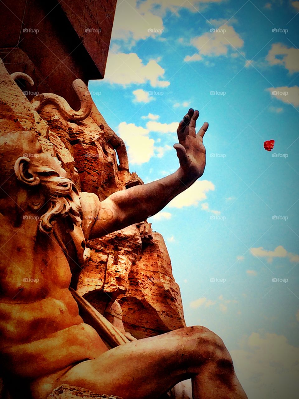 Fountain in Piazza Navona Rome, Italy reaching for balloon heart 