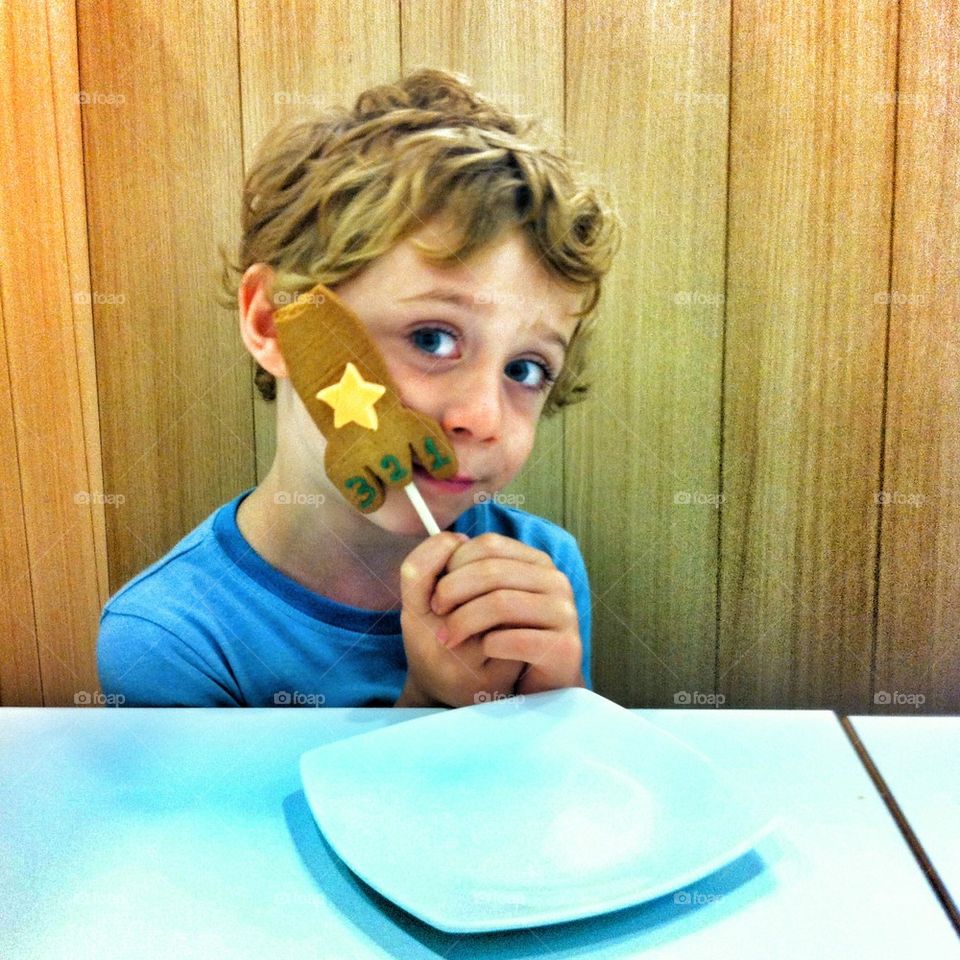 Boy with a biscuit 