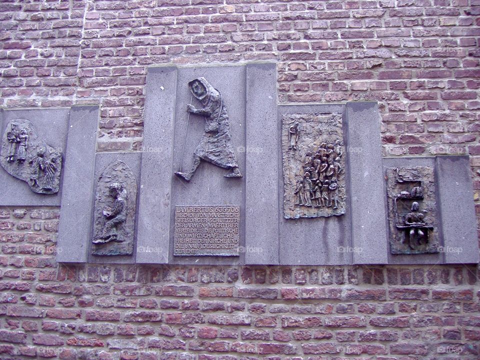 Decorative bars on a bricky wall