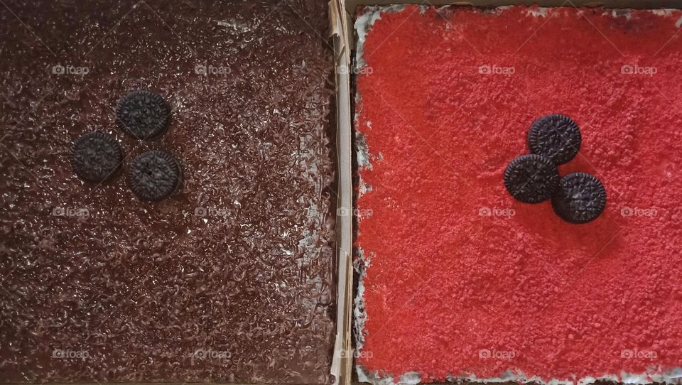 Red and brown cake on table