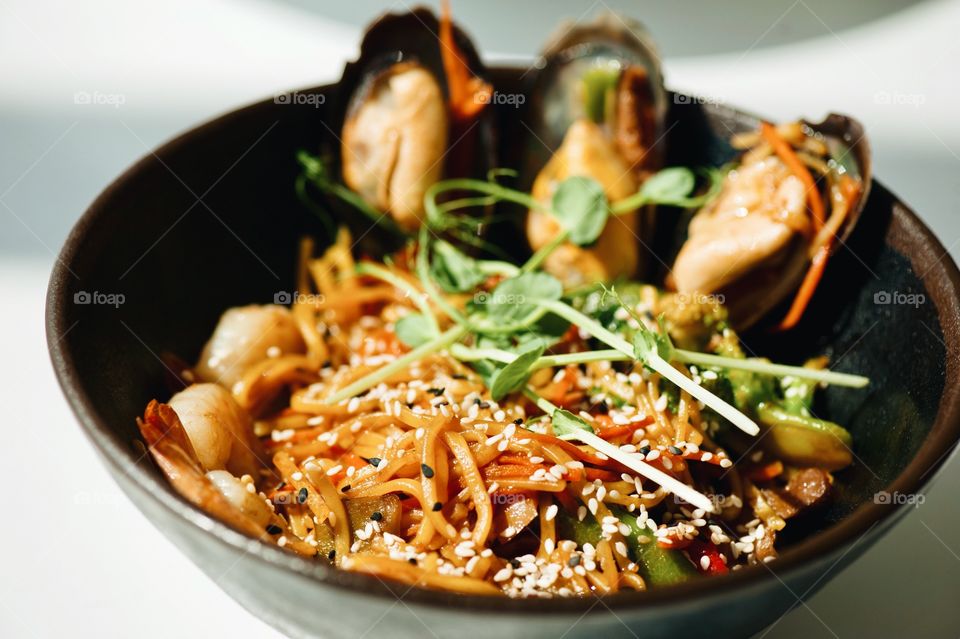 close-up of a plate with Asian cuisine