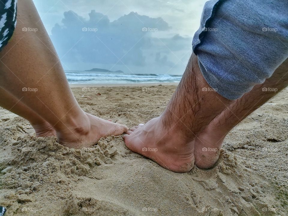 Vowed for togetherness.couple having good time at beach.
