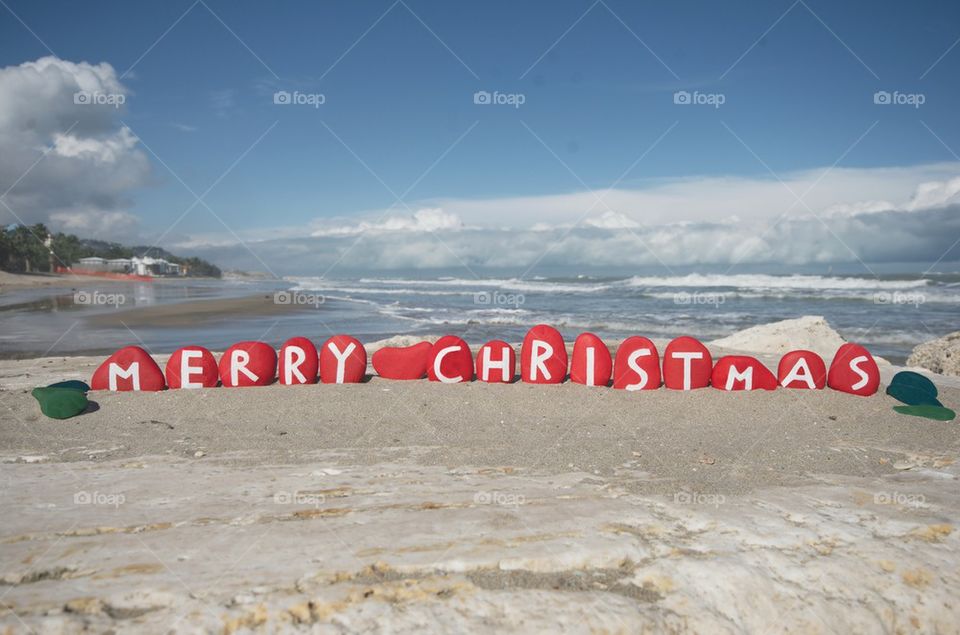 Merry Christmas on red stones