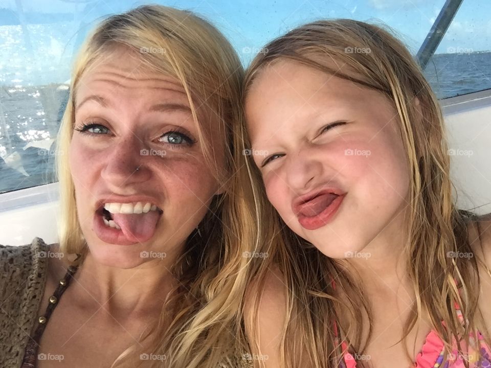 Mother and daughter making silly faces