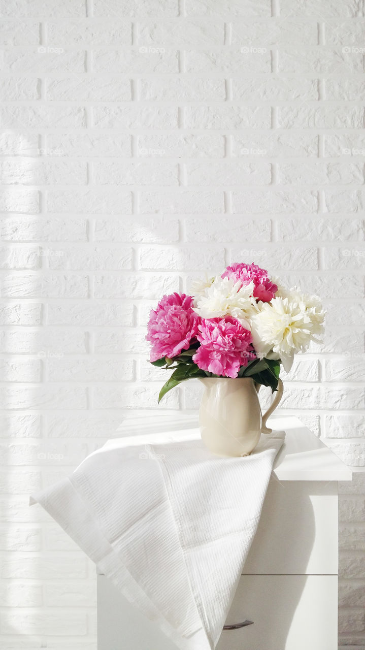 Bouquet of peonies. Light photography