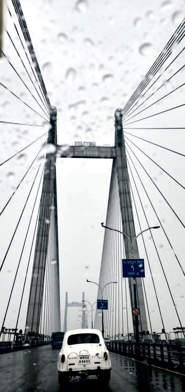 A beautiful view captured.Water drops steam on car window glass background.