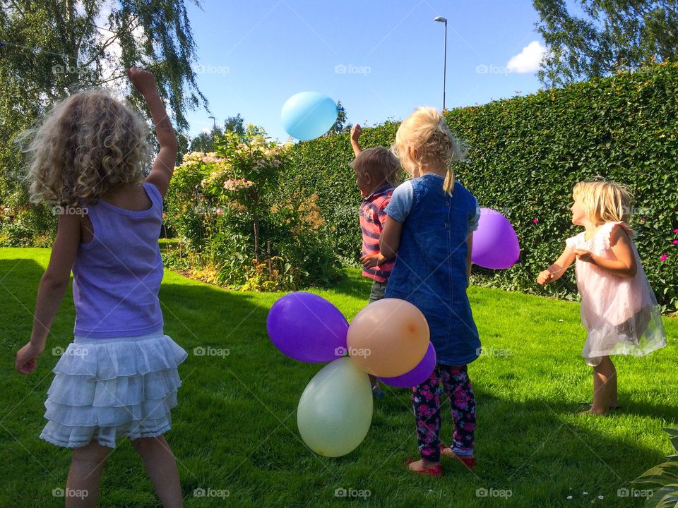 Playing with balloons