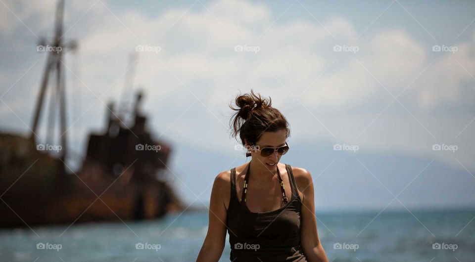 Woman and shipwreck