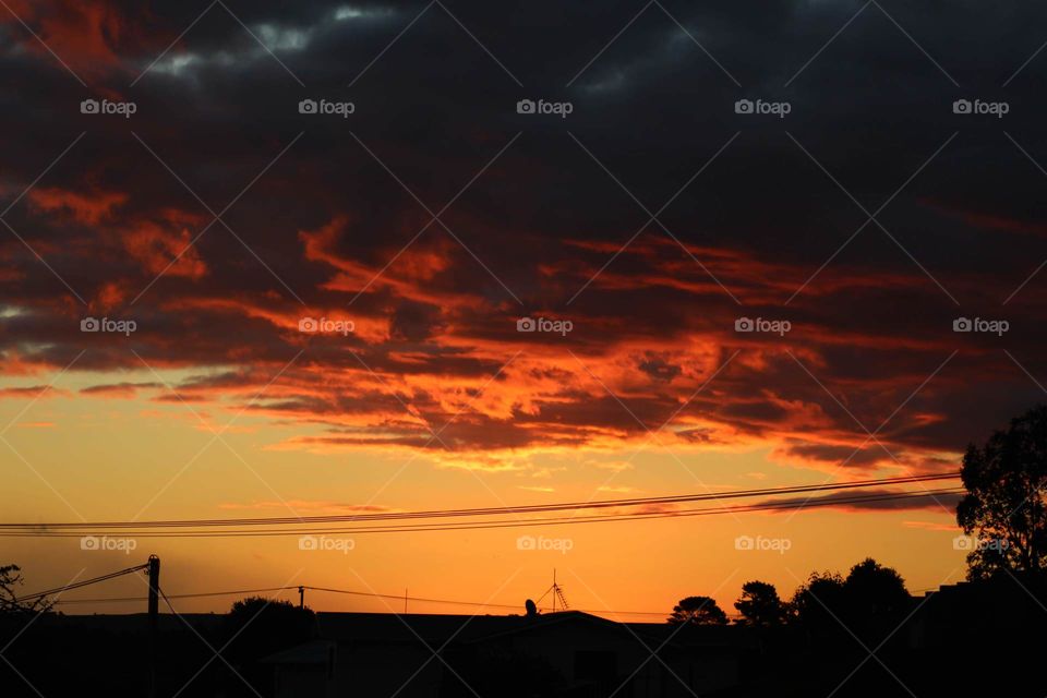 thundering clouds in the sunset
