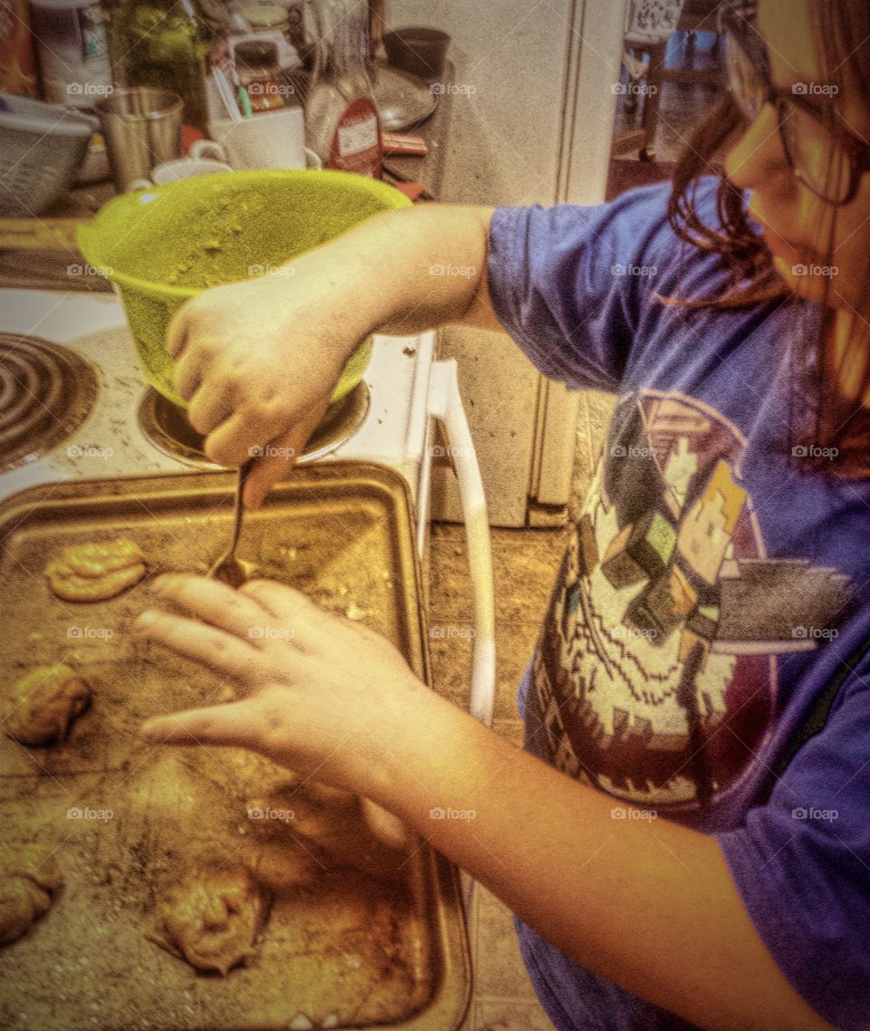 Little girl preparing cookies