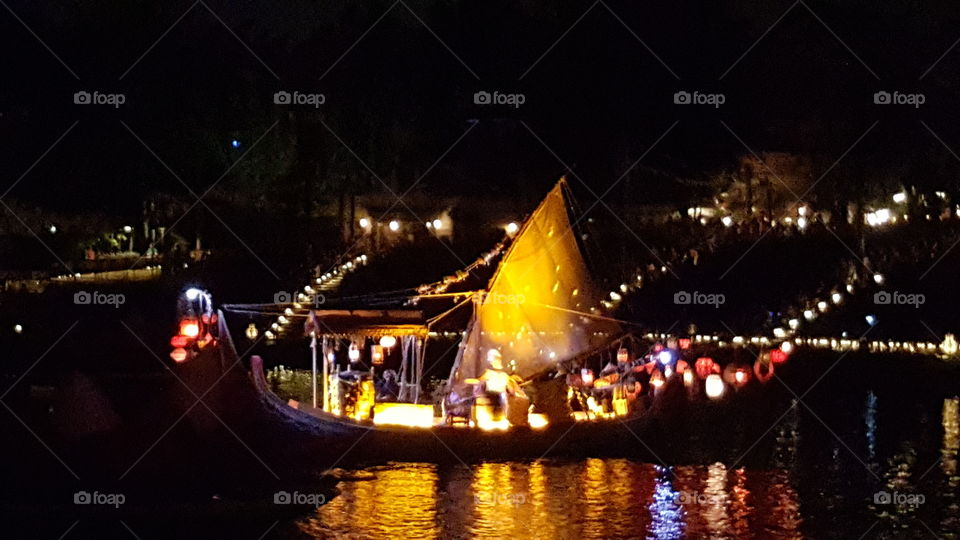 A ship blazes into the waters of Discovery River at Animal Kingdom at the Walt Disney World Resort in Orlando, Florida.