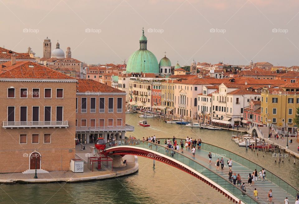 Bridge through the canal of venice