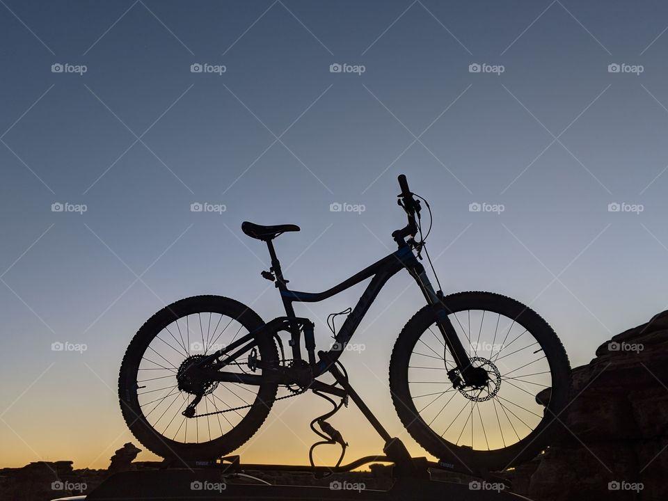 silhouette of a bike in Canyonlands National Park