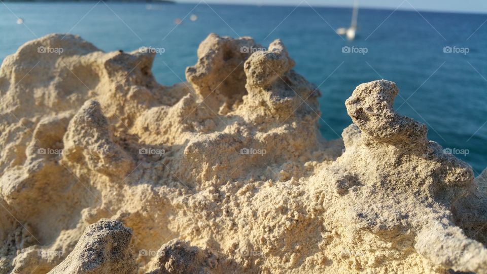 rock. top view from below of a rock in torre dell'orso's coast