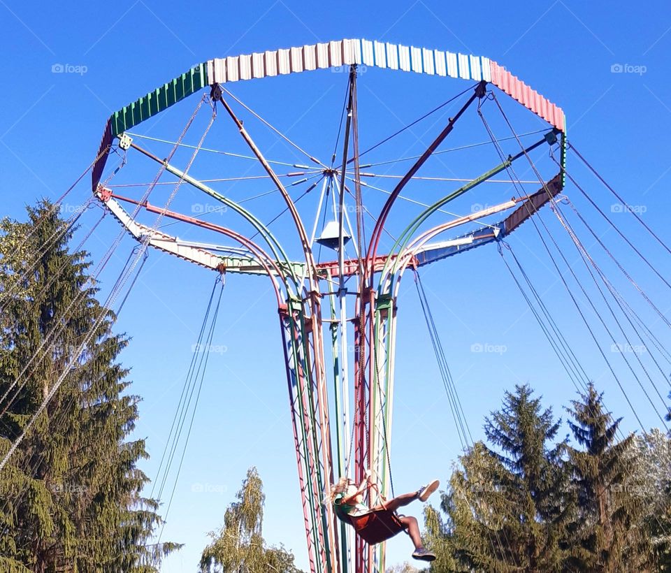 having a nice day in the amusement park