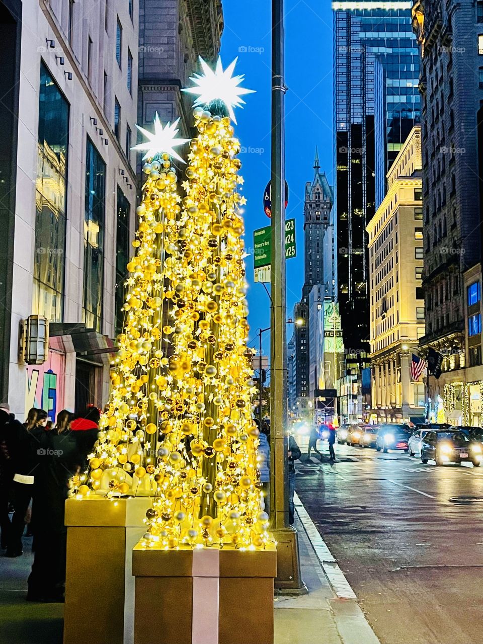 City Sidewalk - City sidewalk, busy sidewalk dressed in holiday style. In the air there is a feeling  of Christmas. 