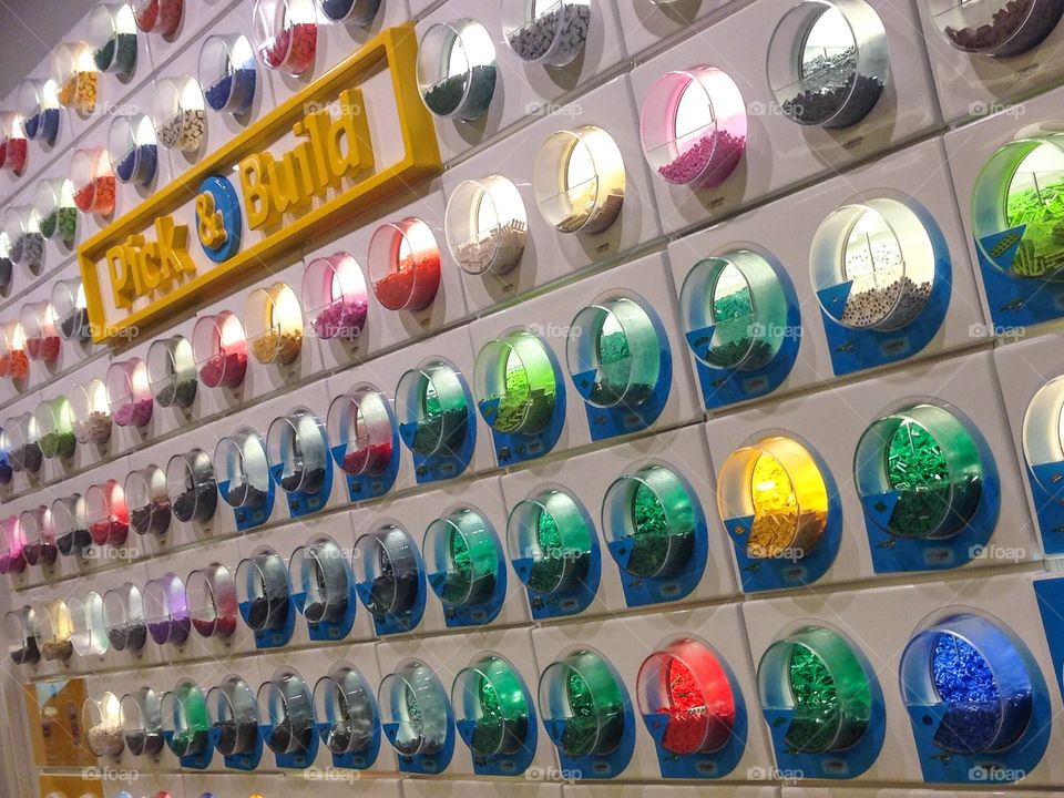 Lego store in Nashville a wall filled with different kind of color stones