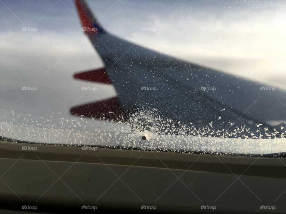 Airplane window frost