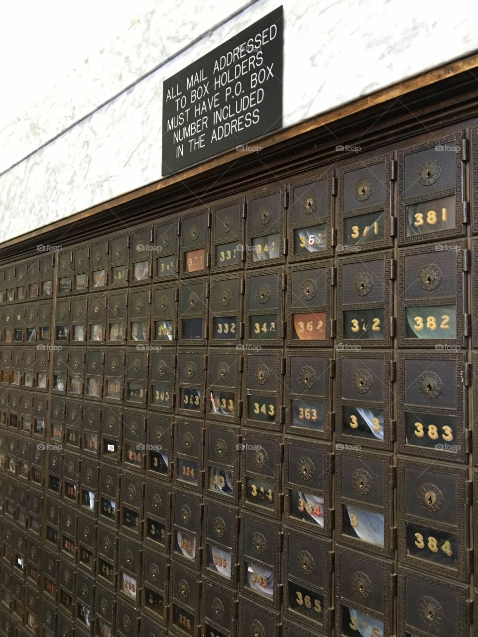Mailboxes at U.S. Post Office, marble walls.