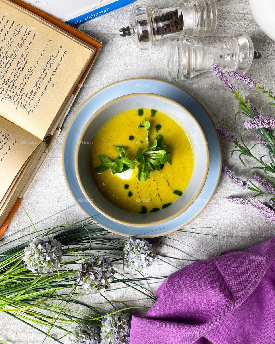 Vegetable soup with goat cheese