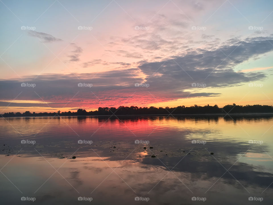 Magic sunrise in summer on the river