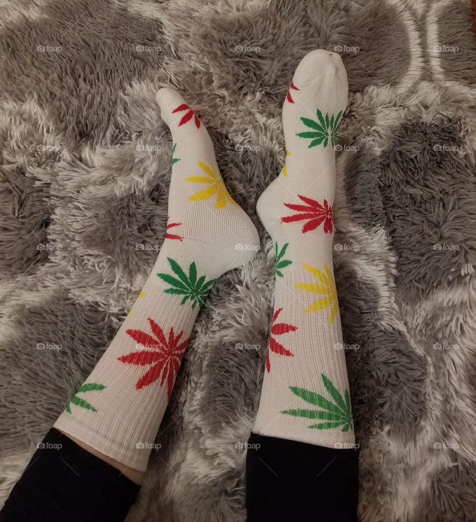 Popfizzy White and Rasta colored weed socks.