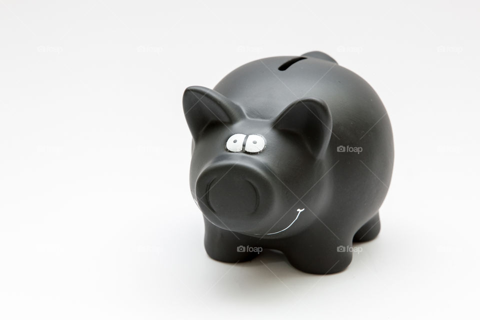Black Piggy Bank Isolated In White Background
