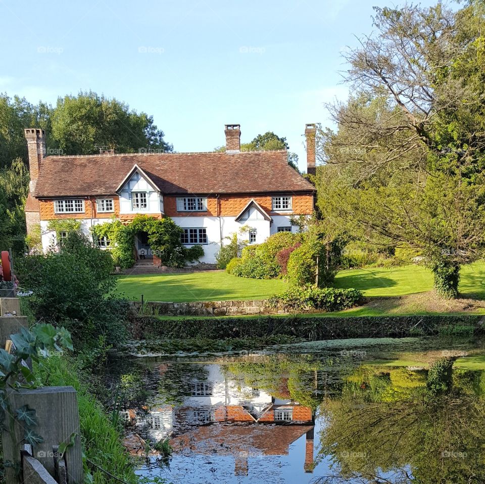 country house over looking a pound