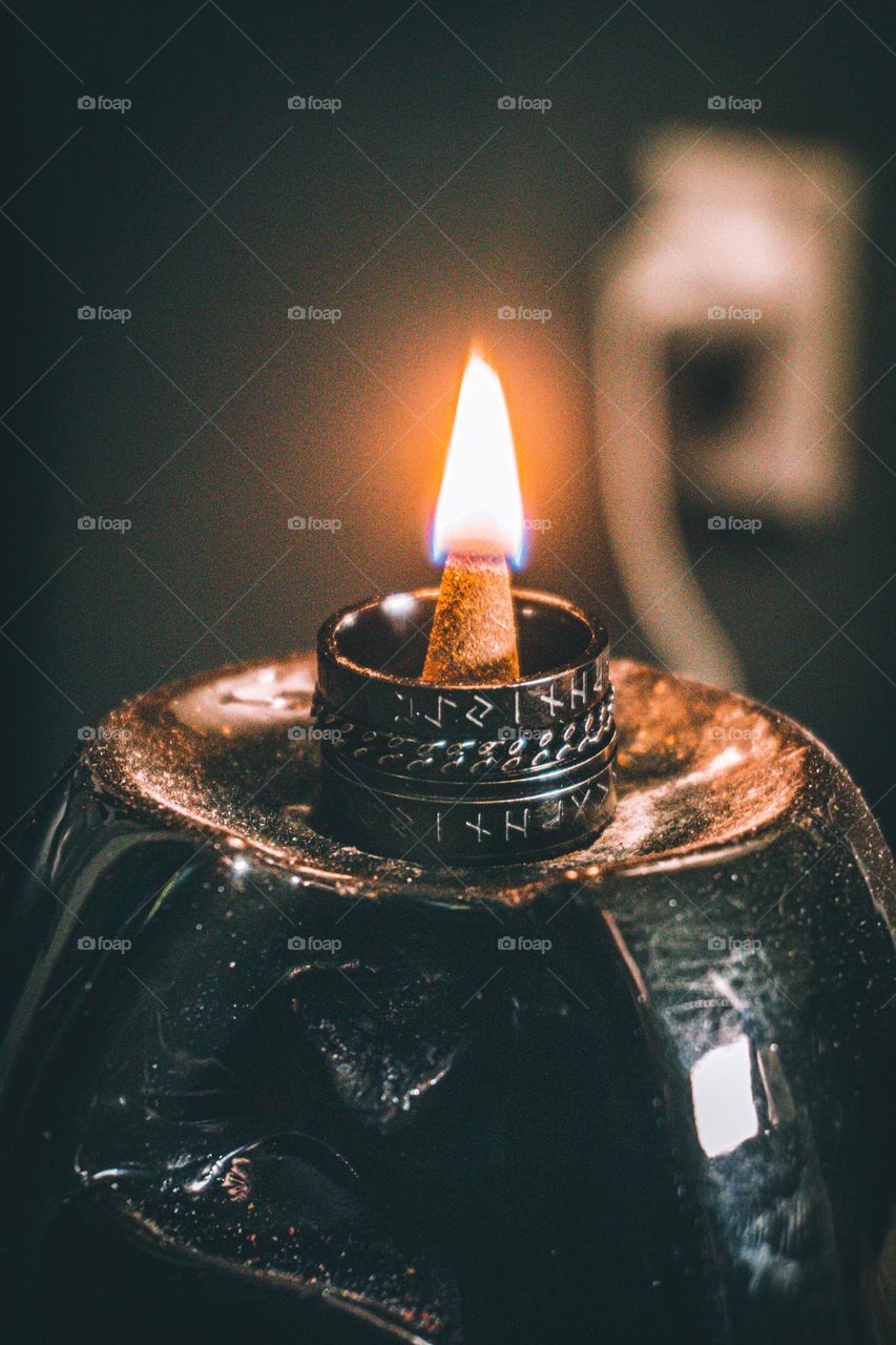 On fire incense in between rings.