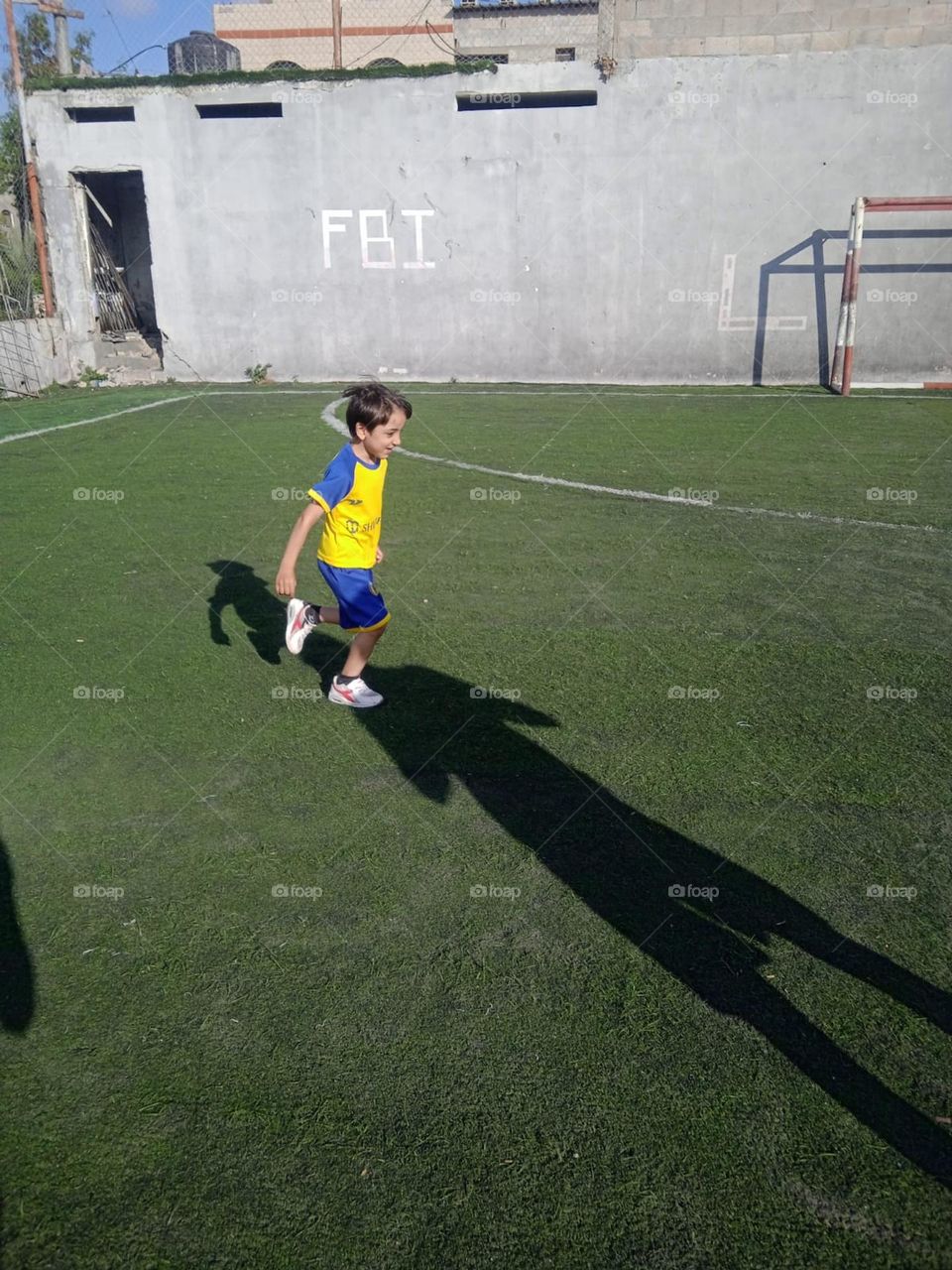 The child is excited about soccer