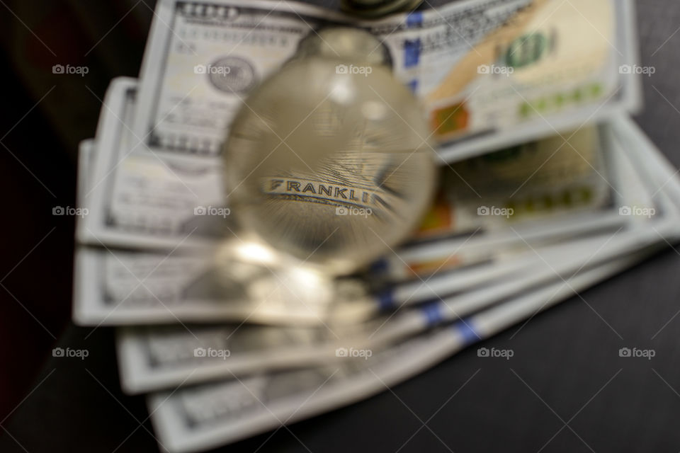 transparent globe on dollars