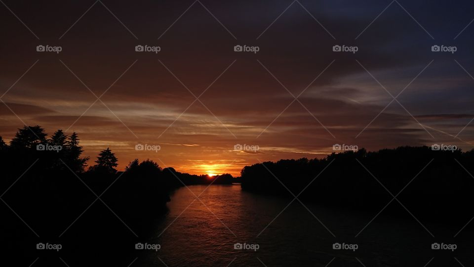 wonderful Italian sunset, river, sun and forest 7